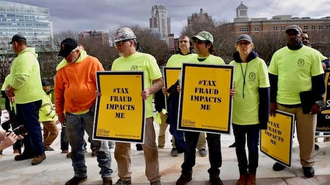 Elected leaders join Carpenters in rally at State House to call attention to tax fraud