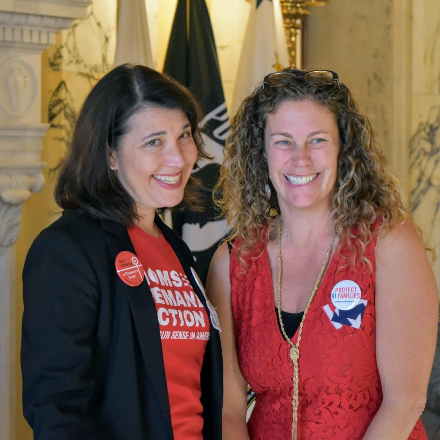 Raimondo signs the Protect Rhode Island Families Act into law