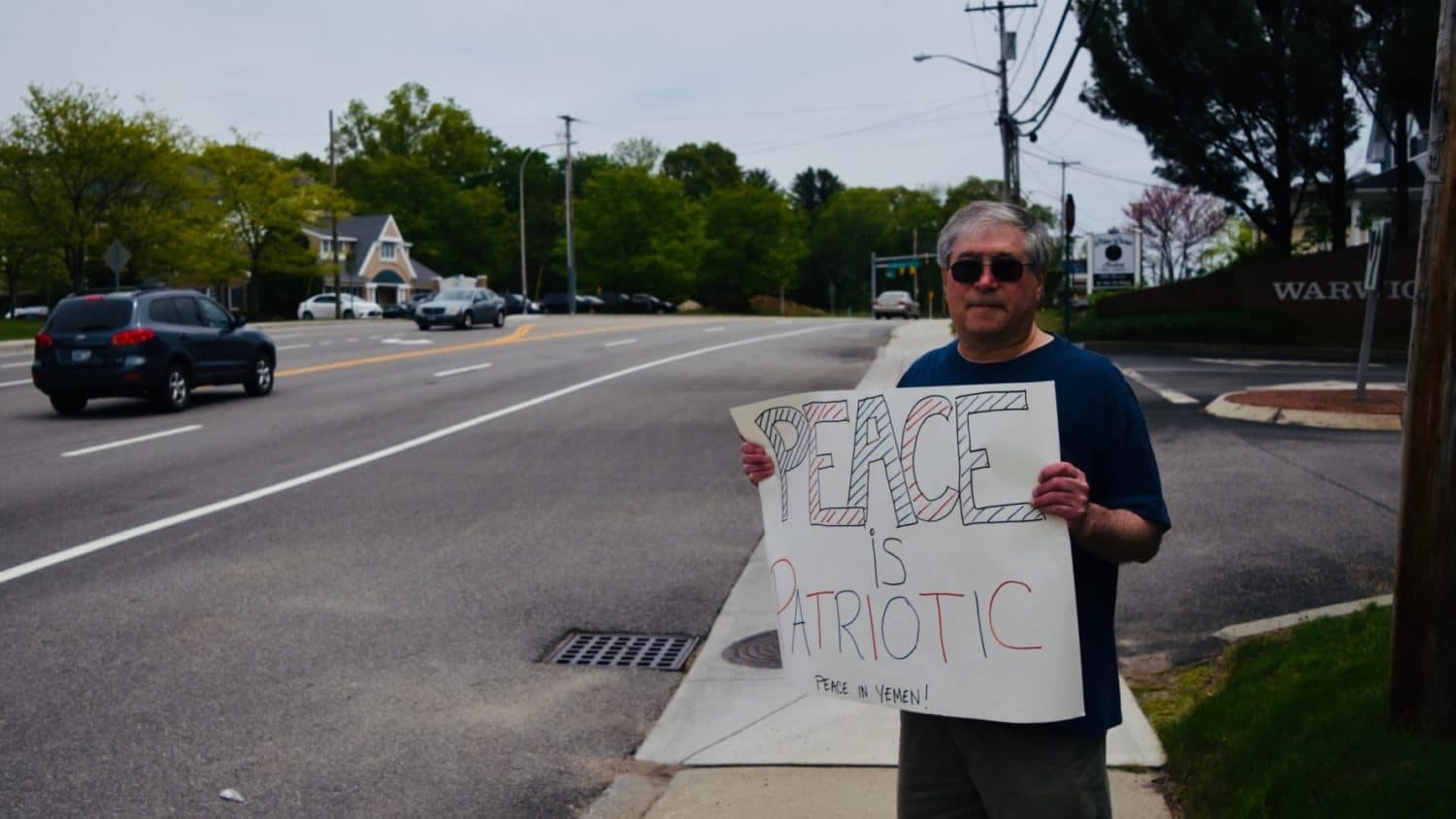 Rally outside Senator Reed's office in downtown Providence on Wednesday