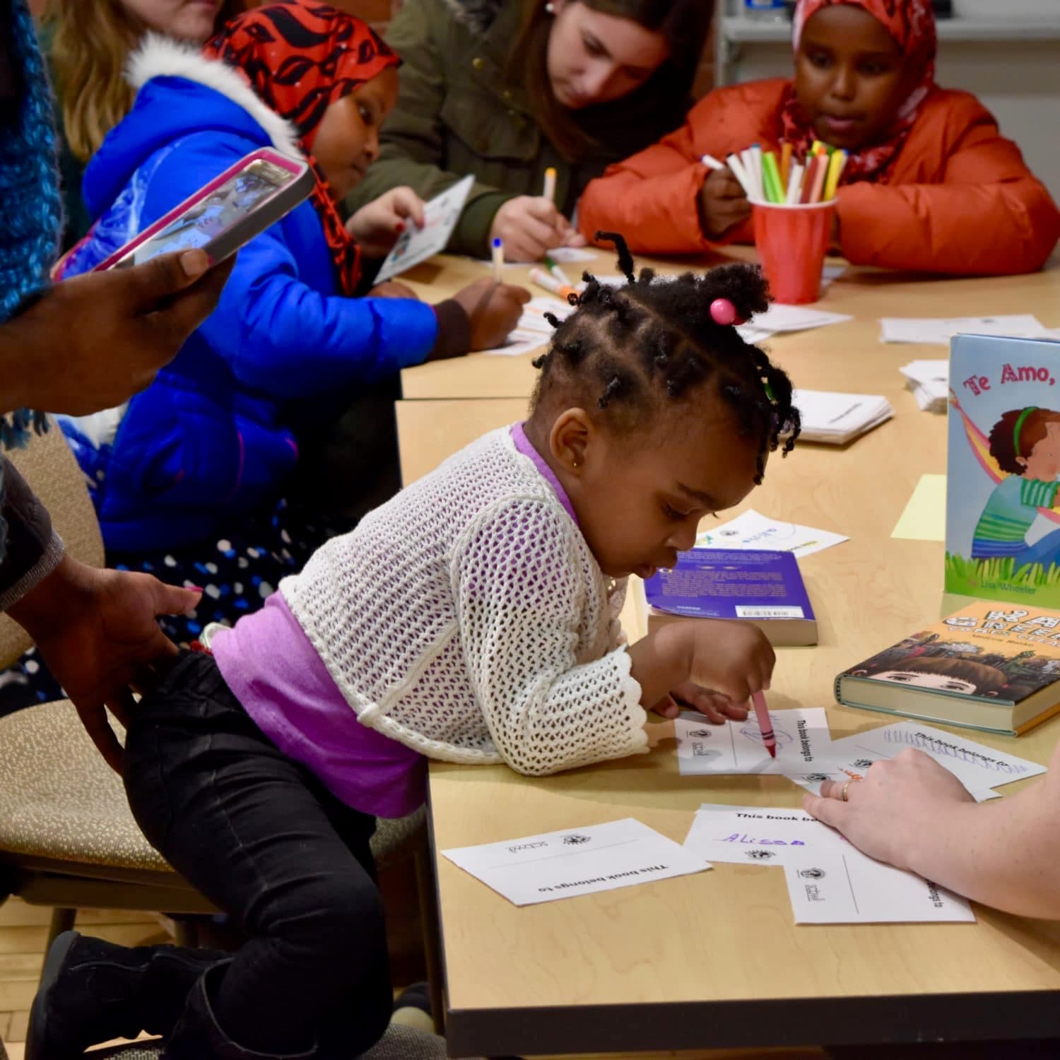 Refugee Dream Center awarded a children’s library of books by SCBWI