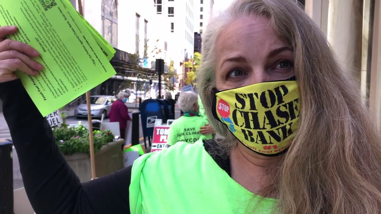 Climate Action RI protests Chase Bank's flooding of downtown Providence
