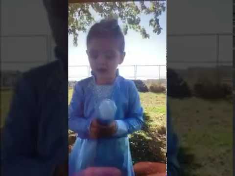 Janie’s Three-Year-Old Singing with Construction Trucks in the Background