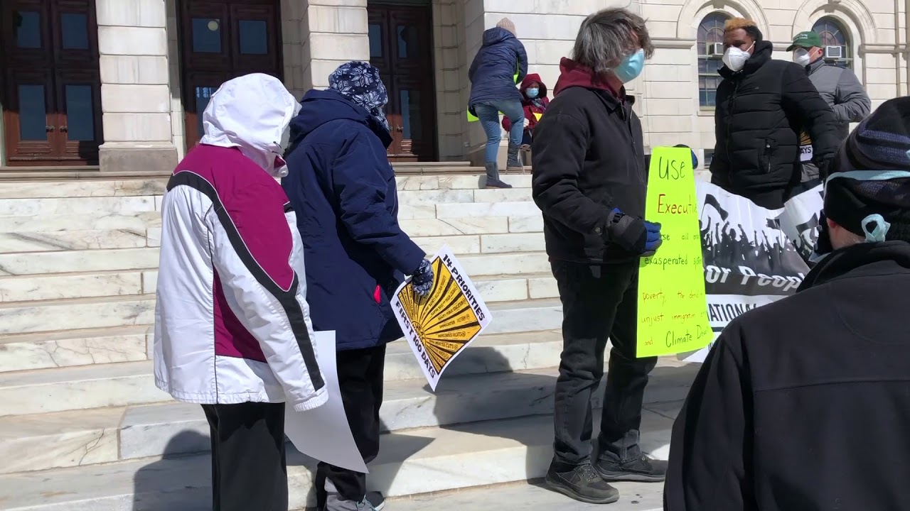 RI Poor People's Campaign Symbolically Nails Their Policy Priorities to the RI State House Doors
