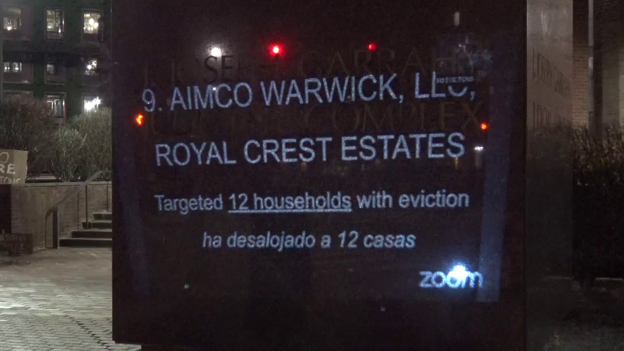 The "Top Ten Worst Evictors" in Rhode Island Slideshow is Projected Onto a Providence Courthouse