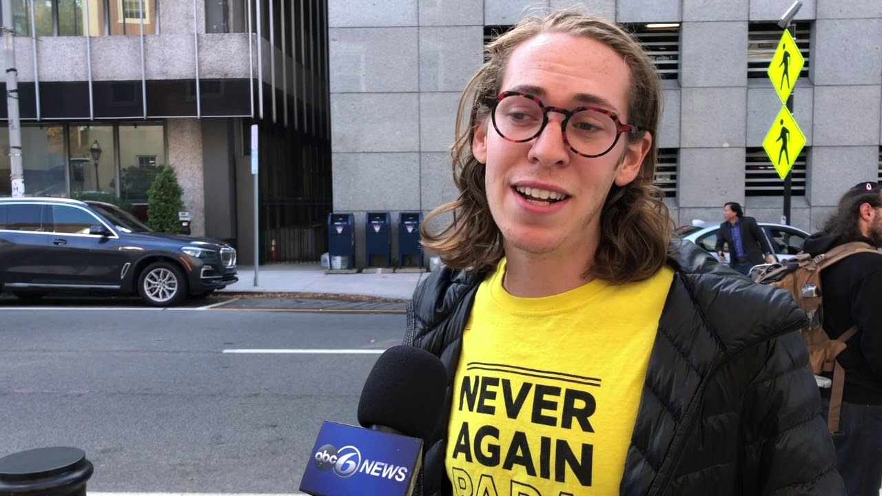 Tal Frieden of Never Again Action Speaks During Protest Outside Attorney General’s Providence Office