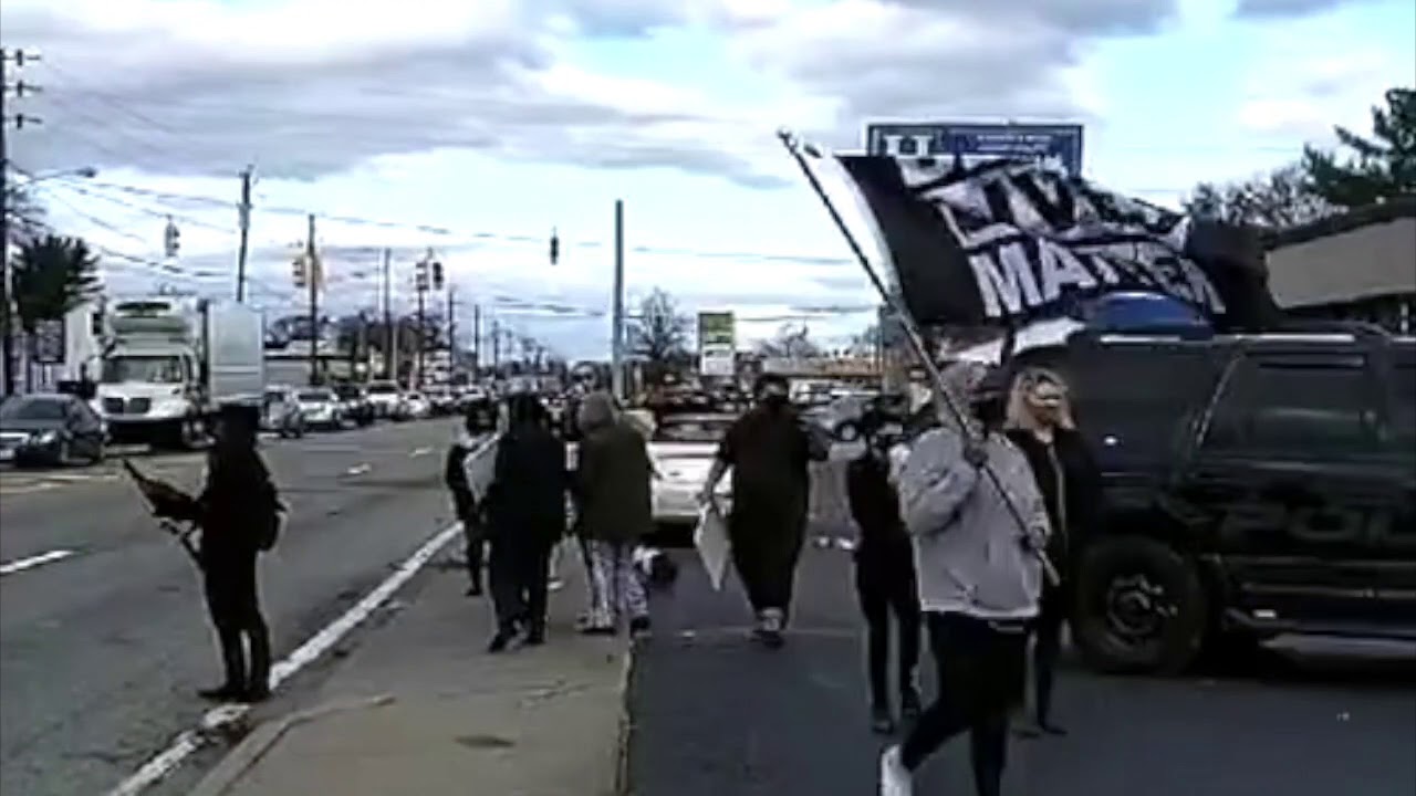 Trump Supporters Hit a BLM / Pro-Democracy Protester at a 'Stop the Steal' Rally in Rhode Island