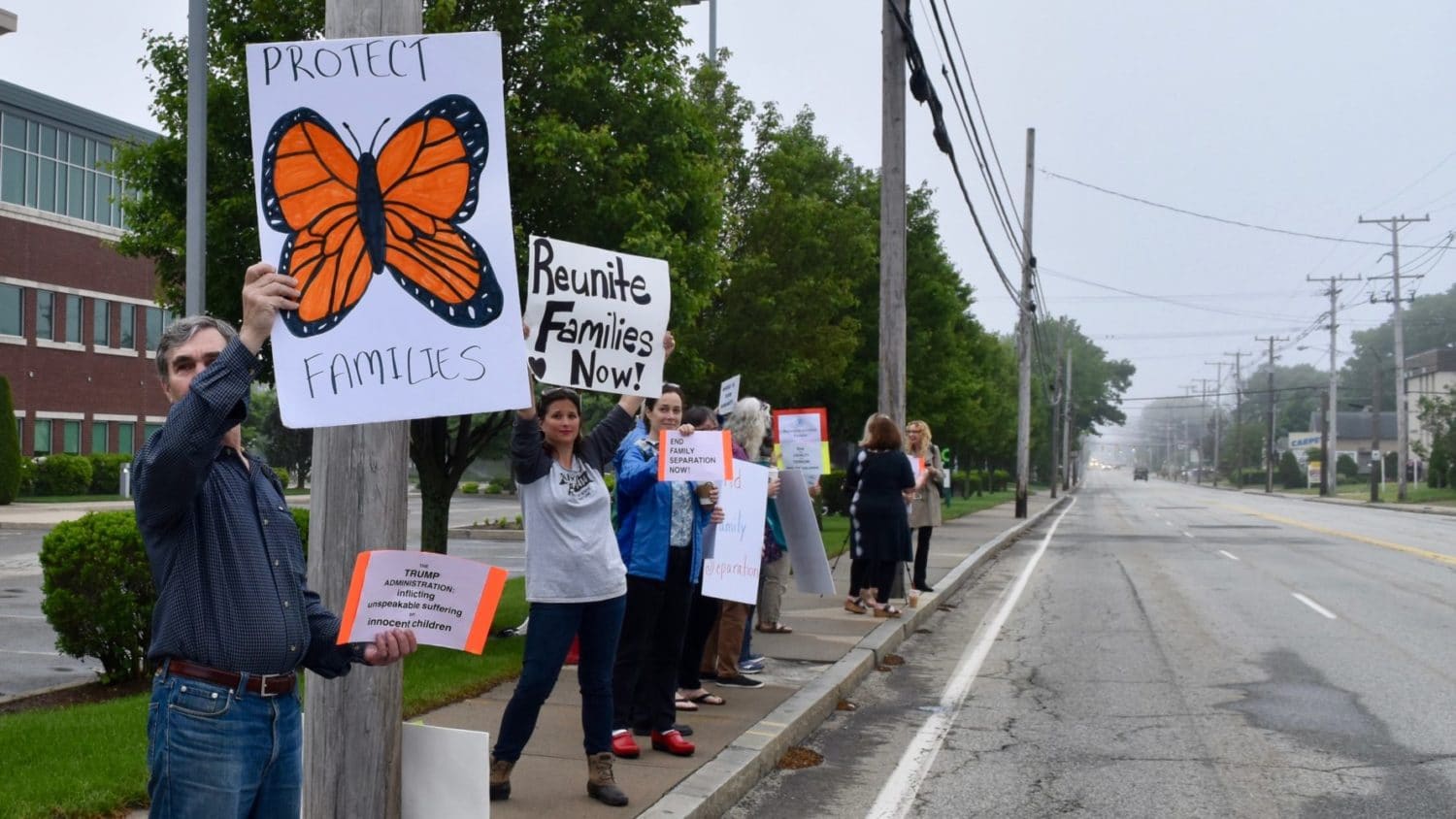 Protesters demand end to family separation at Homeland Security office in Warwick