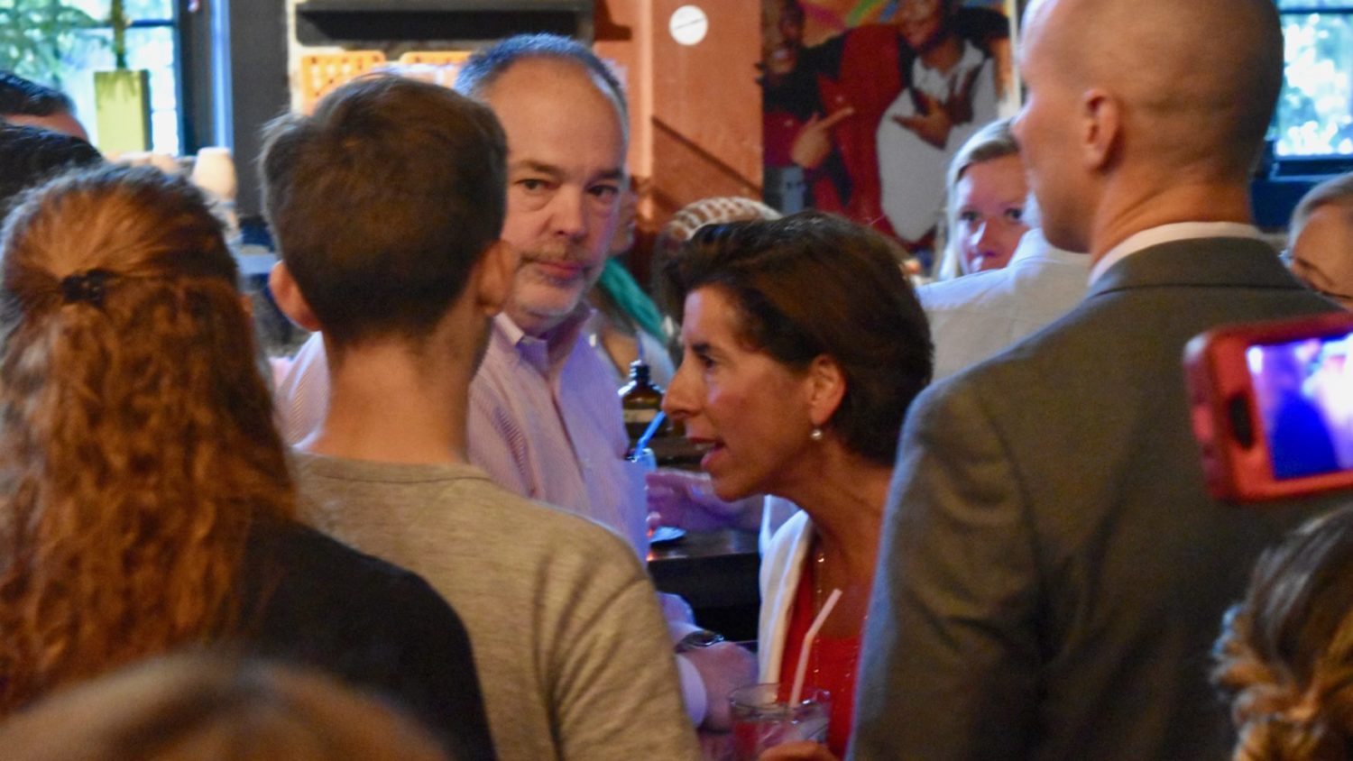 Raimondo challenged by environmental groups at campaign event