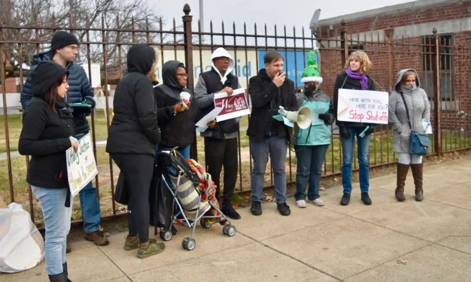 George Wiley Center demands a walk-in payment center from National Grid, with Christmas Carols