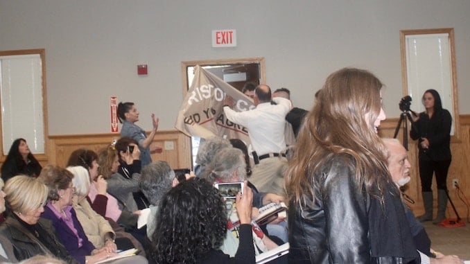 Two protesters from FANG Collective arrested at Bristol County Sheriff public meeting