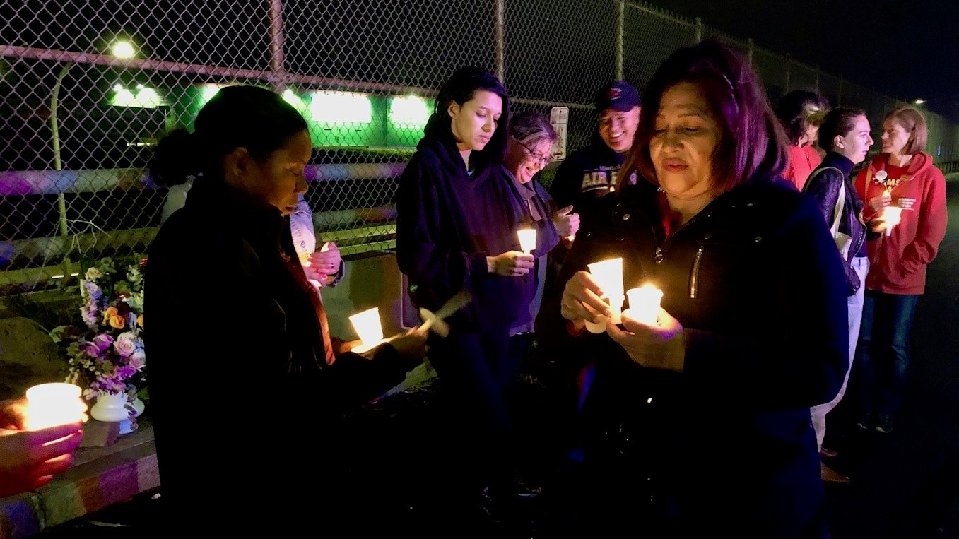 A candlelight vigil in memory of 19 year-old shooting victim Berta Perreira-Roldan