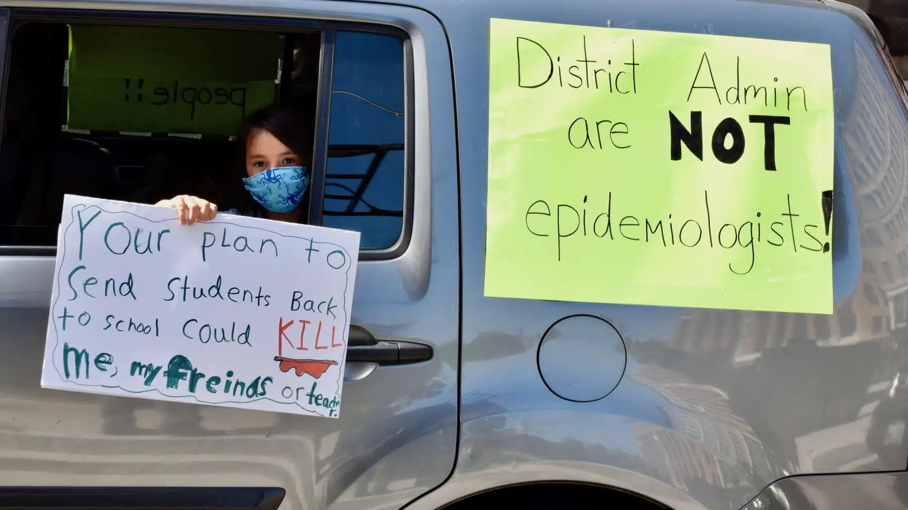 Car rally outside RIDE demands a safe return to school