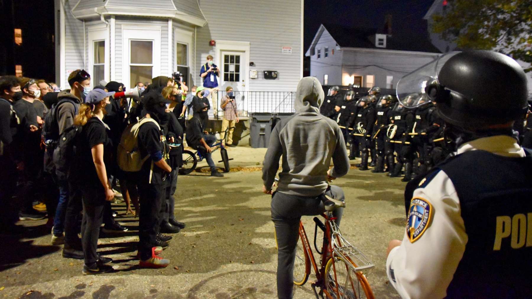 Police in riot gear prevent Federal Hill restaurant patrons from viewing peaceful protesters