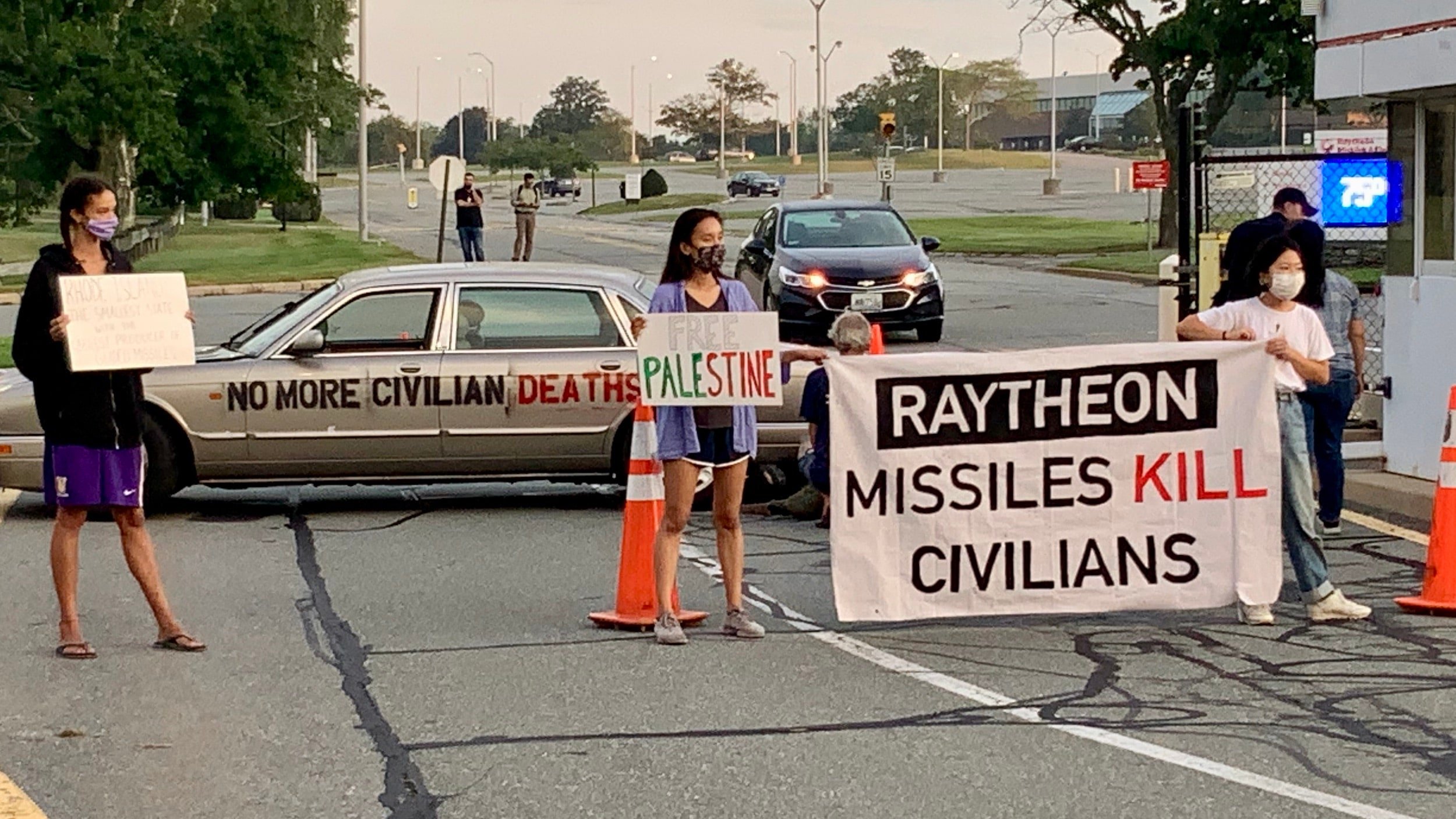Photo for Activists block entrance to Raytheon’s Portsmouth facility