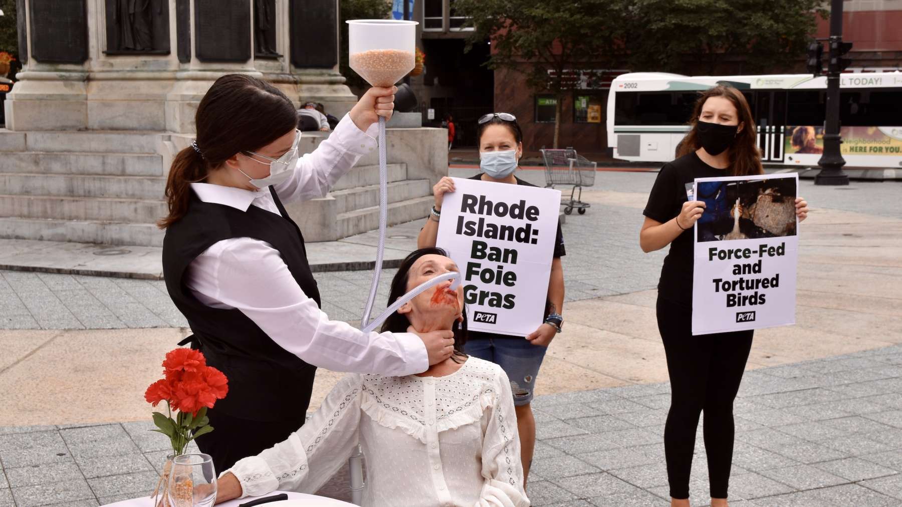 Woman force-fed grains in Kennedy Plaza as part of PETA foie gras protest