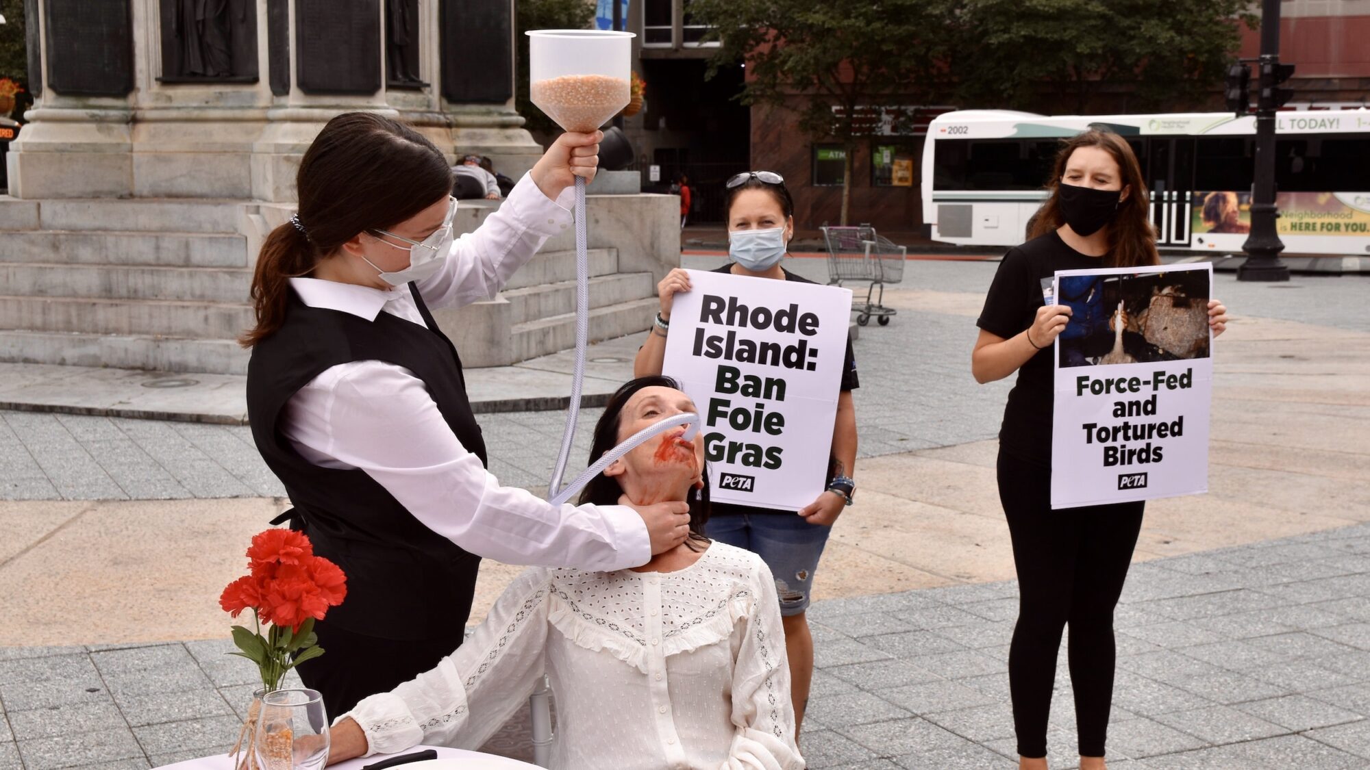 Woman force-fed grains in Kennedy Plaza as part of PETA foie gras protest