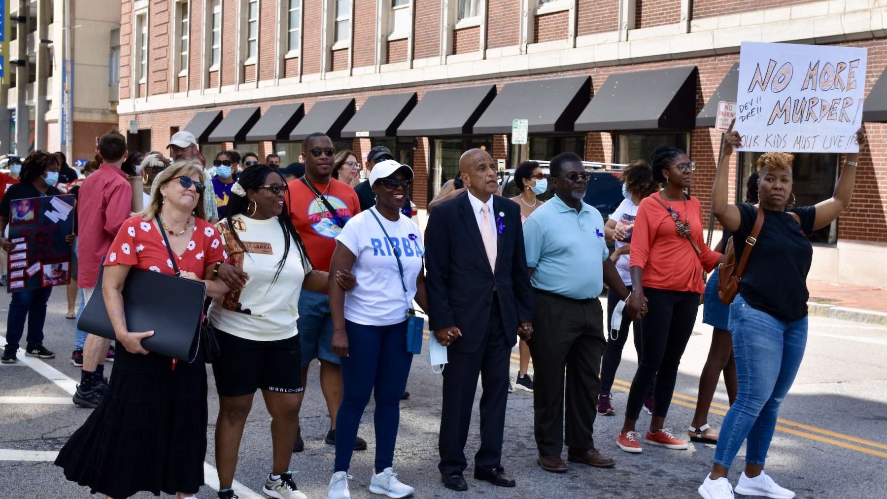 Survivors, advocates and politicians walk against gun violence in Providence on Saturday