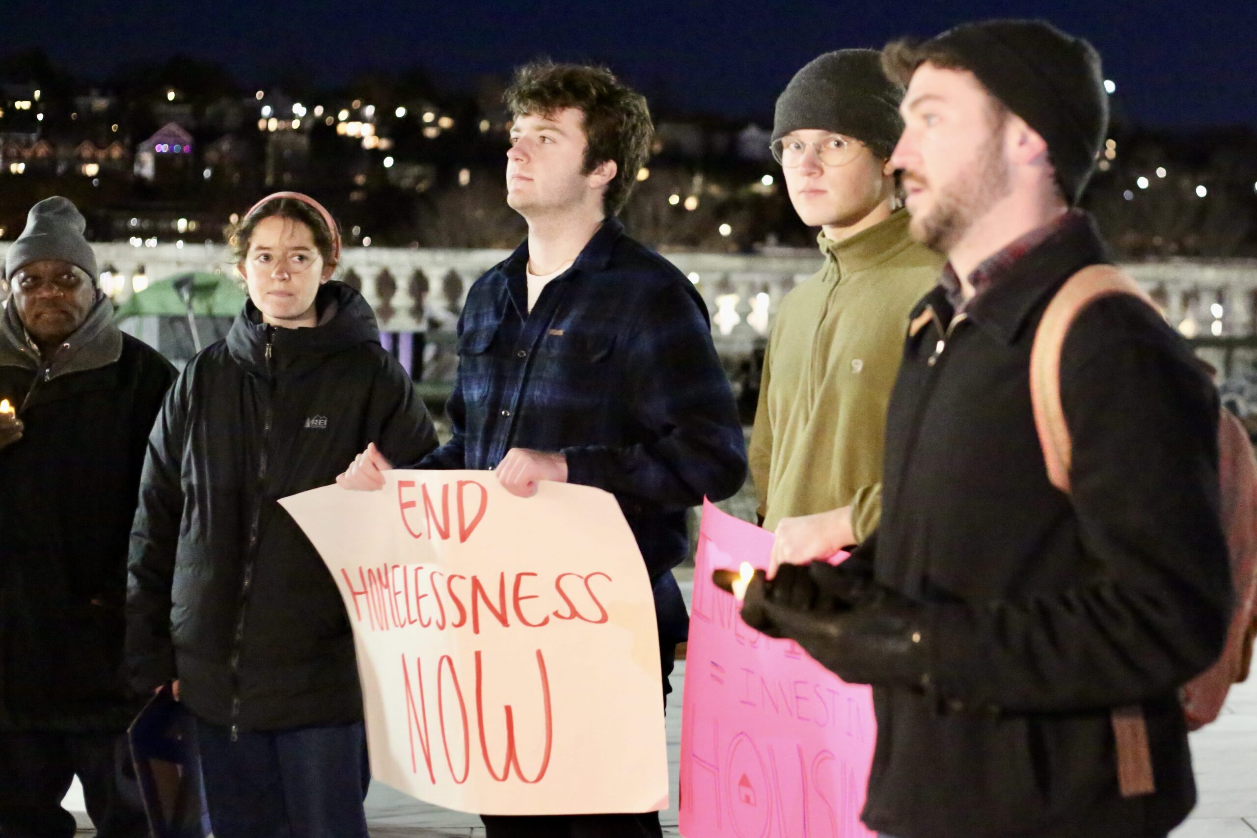 Attendees at a State House prayer vigil opposing Rhode Island Governor Daniel McKee's eviction of a homeless encampment.